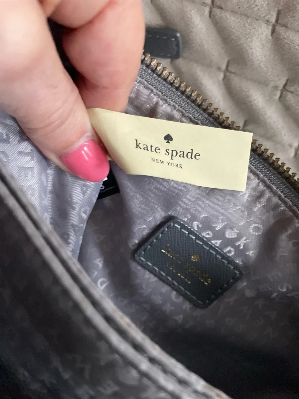 kate spade gray nylon crossbody with gold logo plaque